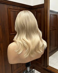 long blonde human hair wig showing smooth, natural wave texture