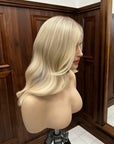 premium 613 blonde human hair wig with soft waves and natural hairline